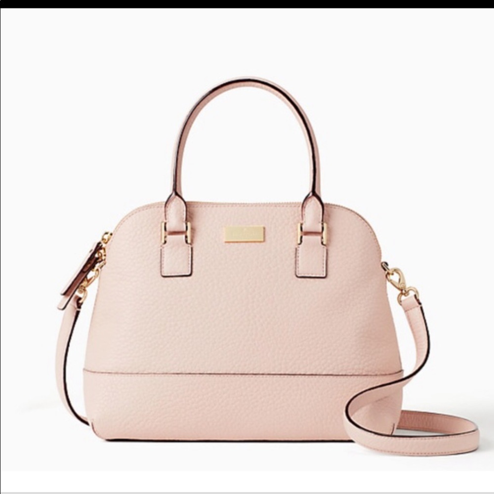 Kate spade  purse it had a damge on the back